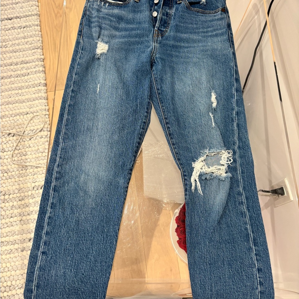 Distressed Levi’s Blue Jeans